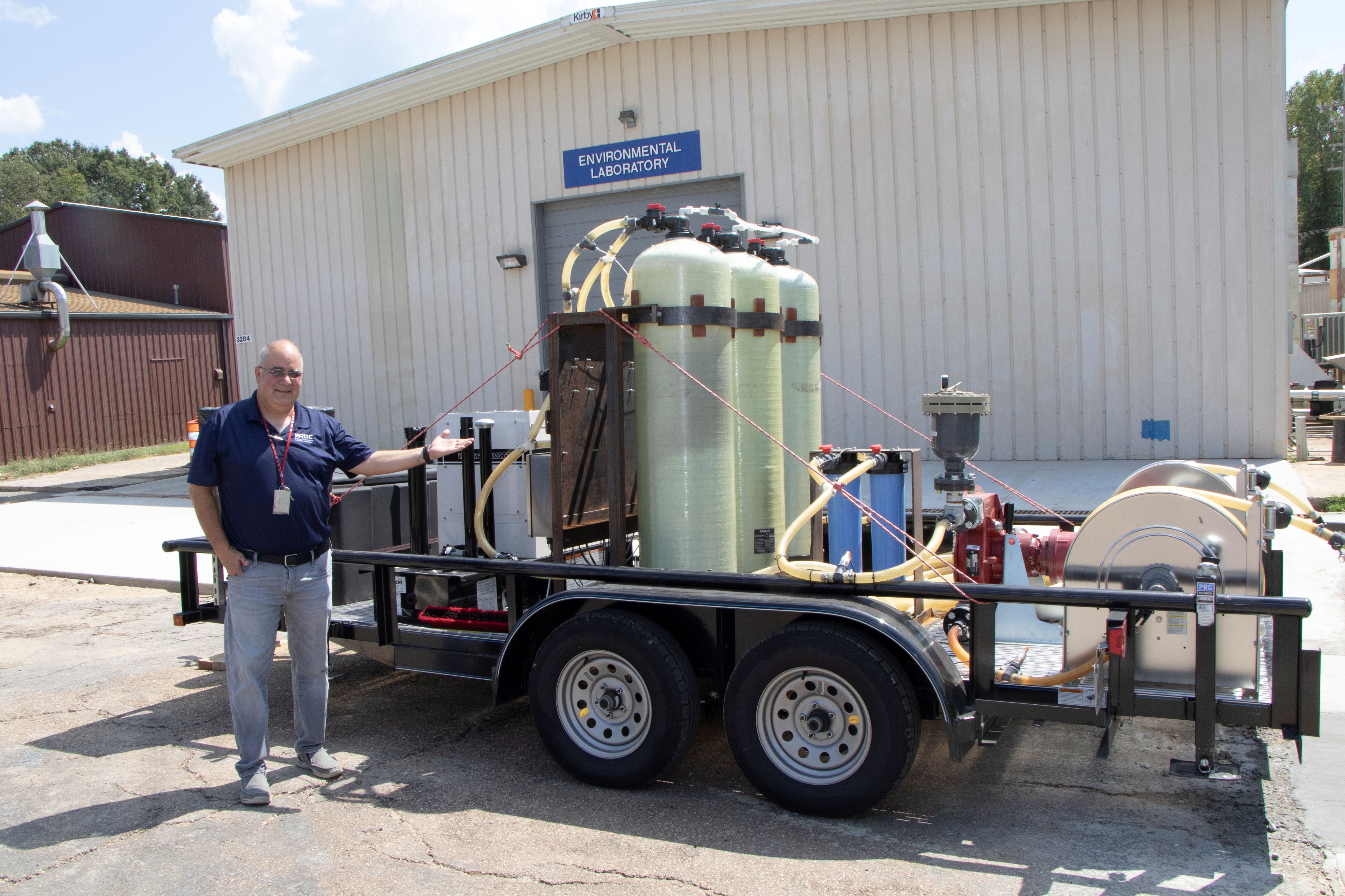 Dr. Victor Medina brandishes his VM PETS filtration device.
